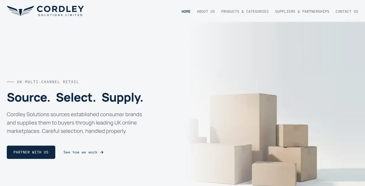 Screenshot of the Cordley Solutions homepage. Navy winged-crest logo reading Cordley Solutions Limited, uppercase navigation for Home, About Us, Products and Categories, Suppliers and Partnerships, and Contact Us. Headline "Source. Select. Supply." above a line describing sourcing established consumer brands for UK online marketplaces, with a navy Partner With Us button beside a photograph of plain cardboard boxes on a pale grey background.